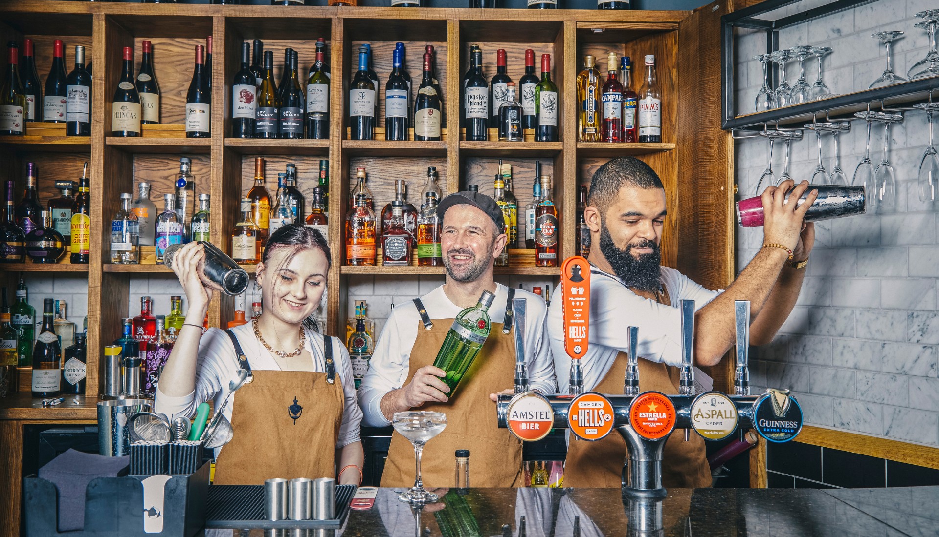 Bartenders making drinks