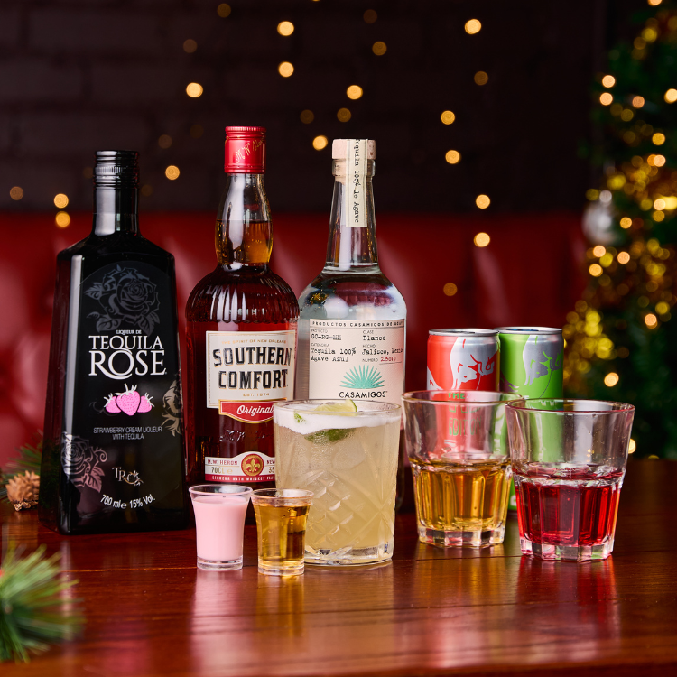Range of festive dishes and glass of red wine Range of festive dishes and glass of red wine