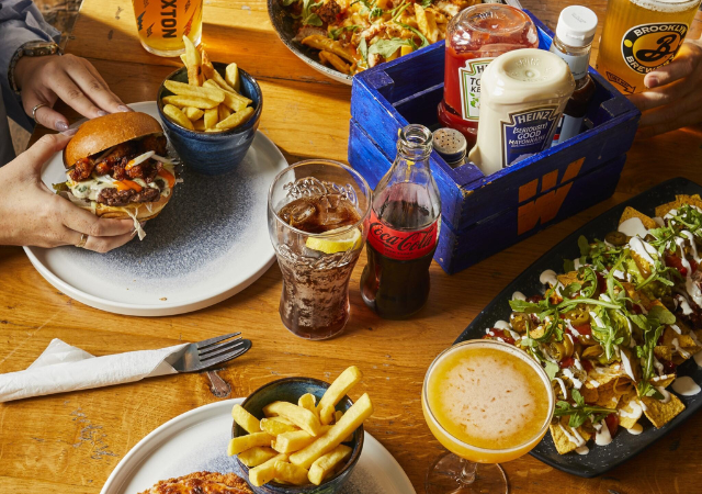 overhead view of various food and drink items on a table overhead view of various food and drink items on a table