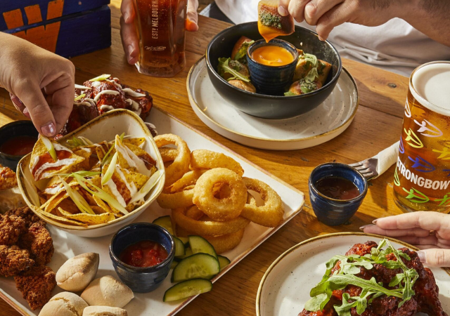 overhead view of various food and drink items on a table overhead view of various food and drink items on a table