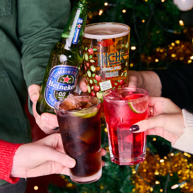 People cheersing drinks People cheersing drinks